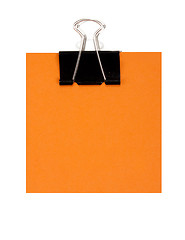 Image showing Orange note and black staple