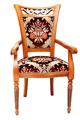 Image showing Beautiful wooden chair with expensive drapes