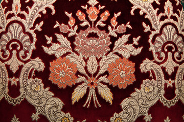 Image showing Crimson fabrics with golden pattern