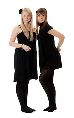 Image showing Two girls in black dresses