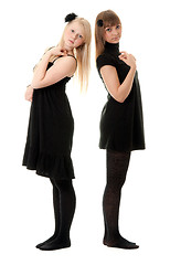 Image showing Two girls in black dresses