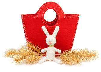 Image showing Red bag and knitted hare