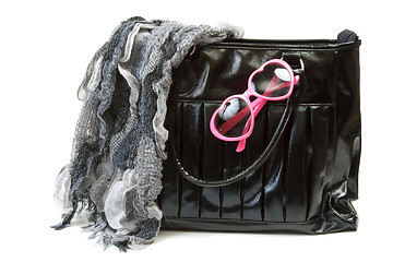 Image showing Feminine bag with scarf and rose-colored glasses