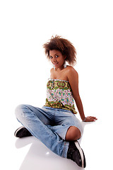 Image showing beautiful black  woman, sitting on the floor