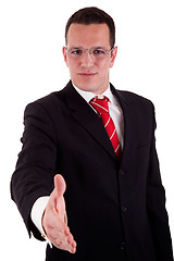 Image showing handsome business man, with the arm extended for a handshake