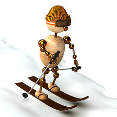 Image showing wood man skiing down a slope