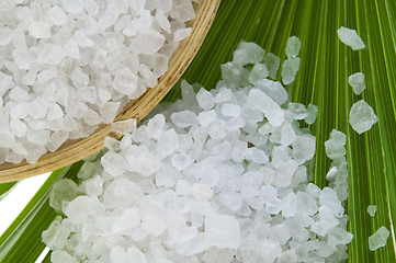 Image showing bath salt and palm leaf