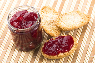 Image showing Breakfast of cherry jam on toast
