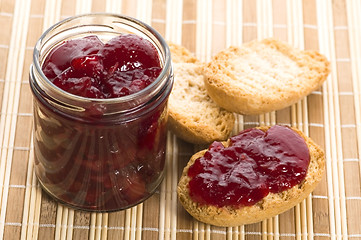 Image showing Breakfast of cherry jam on toast
