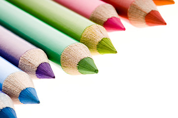 Image showing Collection of colorful pens over white background