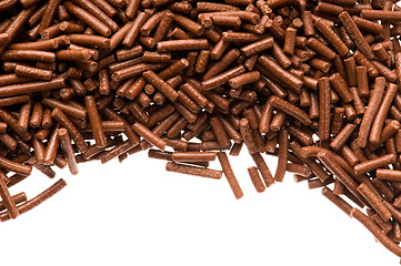 Image showing chocolate sprinkles on white background