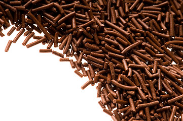 Image showing chocolate sprinkles on white background