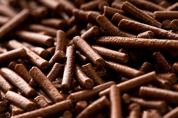 Image showing chocolate sprinkles on white background