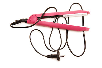 Image showing Electric pink hair straightener