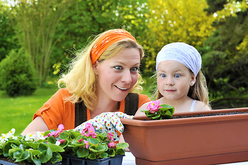 Image showing Mother and daughter having gardening time