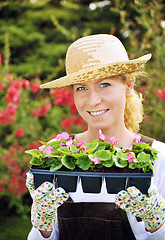 Image showing Woman with container-grow