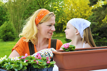 Image showing Mother and daughter having gardening time