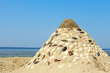 Image showing Pyramid of sand and shells