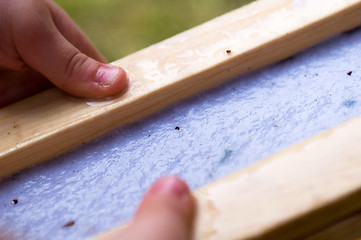 Image showing child making hand made paper