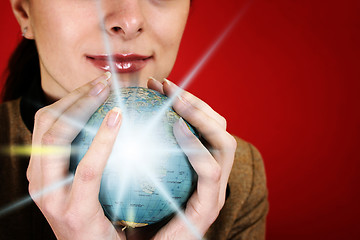 Image showing Globe in a girl's hands