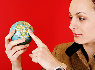 Image showing Globe in a girl's hands