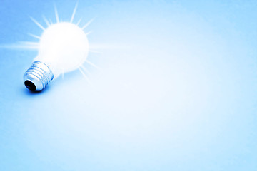 Image showing Background with lit lightbulb