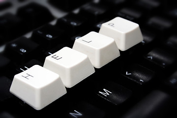 Image showing Black Keyboard, blurred, with white keys - HELP