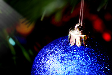 Image showing Christmas ornaments on tree.