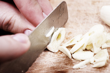 Image showing Chopping the Garlic