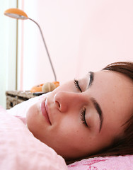 Image showing Beautiful young woman sleeping.