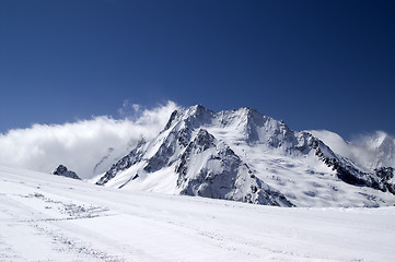 Image showing Ski slope against mountains