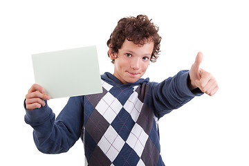 Image showing cute boy with a paperboard in hand giving consent, with thumb up