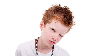 Image showing Cute blond Boy winking and smiling