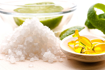 Image showing lemon bath - bath salt, capsule and fresh fruits