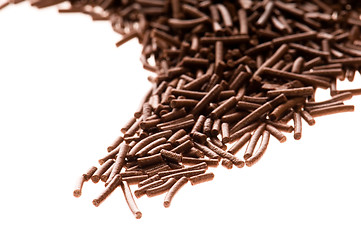 Image showing chocolate sprinkles on white background