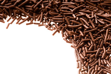 Image showing chocolate sprinkles on white background