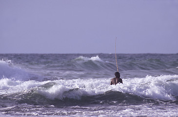 Image showing Black man in the sea