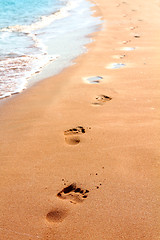 Image showing footprints on sand beach