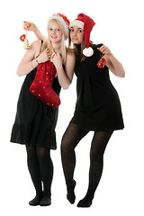 Image showing Two girls in the Santa hat