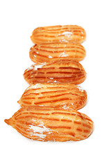 Image showing Delicious eclairs arranged unlikely