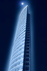 Image showing blue moon blue moon over the tall building