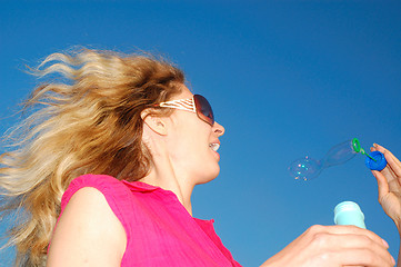 Image showing fun with bubbles and wind