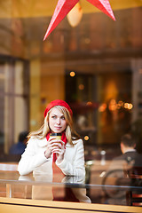 Image showing Woman drinking coffee