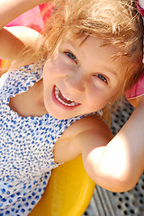 Image showing happy smiling little girl outdoor