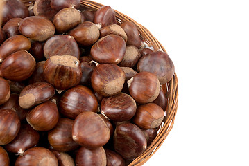 Image showing Wicker basket with chestnuts