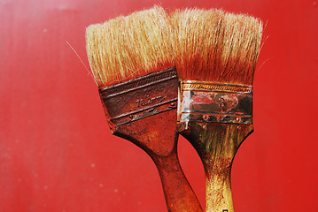 Image showing dirty paintbrushes