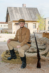 Image showing Retro style picture with soldier sitting on the rope