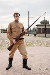 Image showing Soldier with  gun in retro style picture