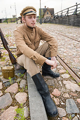 Image showing Retro style picture with resting soldier.