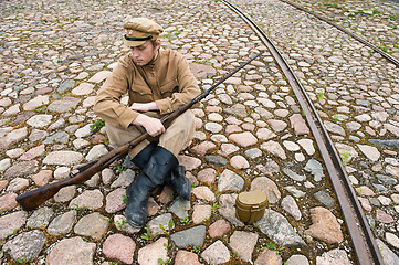 Image showing Soldier with boiler and gun in retro style picture